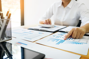 Businesswoman working in office typing on keyboard, female hands text message, work process concept in workspace, writing text on the open monitor