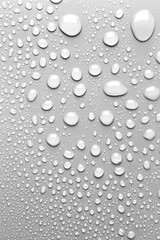 Surface with water drops, grey background
