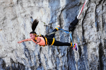 Bungee jumps, extreme and fun sport. Bungee in a cave.