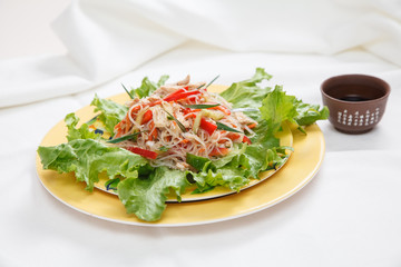 Salad funchoza with vegetables on a plate