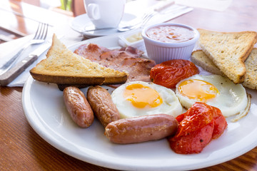 Egg and Toast - classical english breakfast with egg and ham