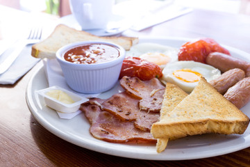 Egg and Toast - classical english breakfast with egg and ham
