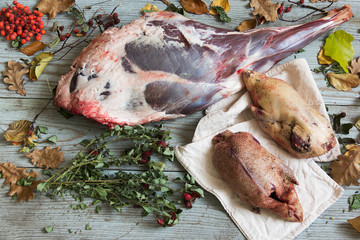 leg of roe deer and two wild ducks