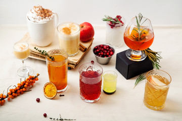 Set of various winter cocktails: mulled wine, eggnog, limoncello, old-fashioned, coconut margarita....