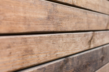 Naklejka premium brown natural wood board use for background.