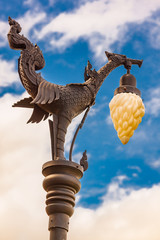 Swan with lantern on the city electric pole