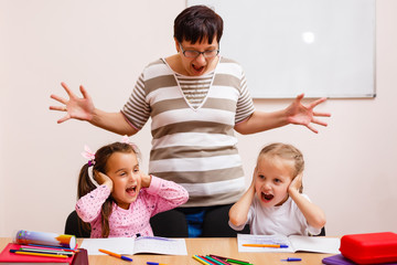 Stressed teacher in a classroom