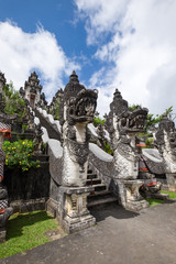 Fototapeta premium The sculpture in front of stair in Pura Penataran Agung Lempuyang in Bali, indonesia
