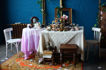 Fototapeta na wymiar decorations for a mad tea party Alice in Wonderland
