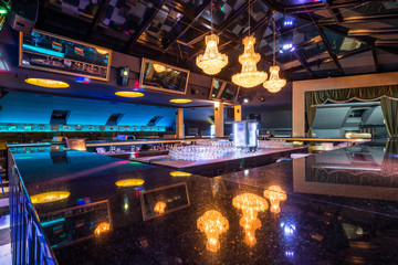 Bar counter and reflection of chandeliers