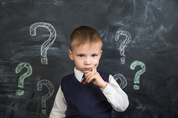 the boy thinks the question marks