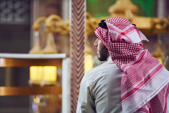 muslim man praying inside the mosque