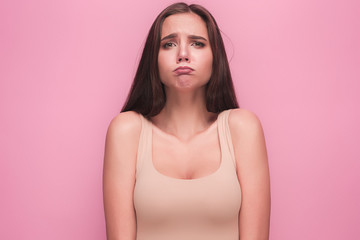 Obraz premium The young woman's portrait with sad emotions