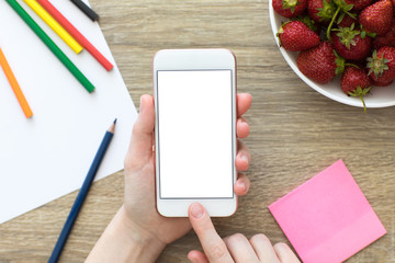 female hands holding white phone with isolated screen