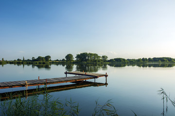 Fototapeta premium Wooden bridge over the lake