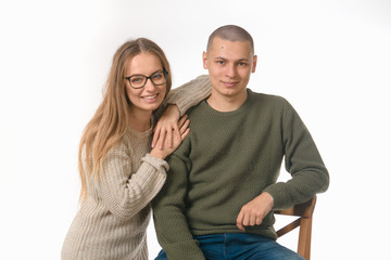 boy and girl . portrait in studio on white.