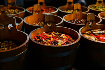 Pickles in wooden barrel.