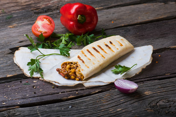  burrito on a wooden background