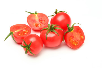 small tomatoes isolated on white background