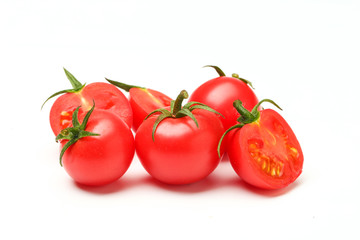 small tomatoes isolated on white background