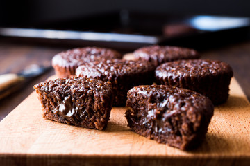 Mini Chocolate Cake Souffle on wooden surface.