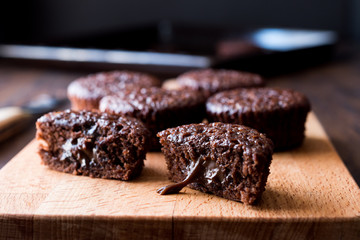 Mini Chocolate Cake Souffle on wooden surface.