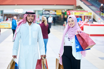 Young muslim couple shopping