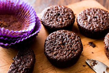 Mini Chocolate Cake Souffle on wooden surface.