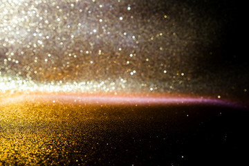 Gold glitter vintage lights texture background. defocused