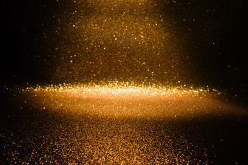 Gold glitter vintage lights texture background. defocused