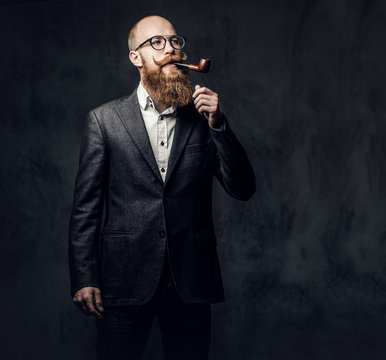 A man smoking tradition pipe.