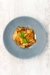 wok fried chicken stir fry with sweet peppers and chinese vegetables