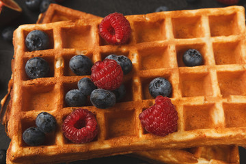 Belgium waffles with berries closeup