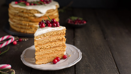 Honey nut ginger and carrot cake decorated with cranberries and rosemary. Perfect Christmas baked goods that you want to eat!)