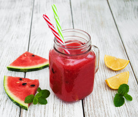 Jars with watermelon smoothie