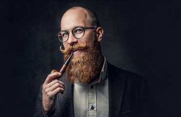 A man smoking pipe over grey background. - Powered by Adobe