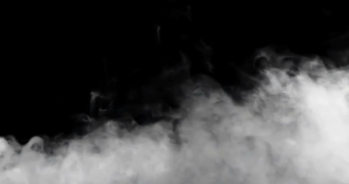 abstract smoke slowly floating through space against black background