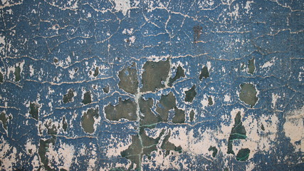 Muro azul manchas pretas e brancas com rachaduras