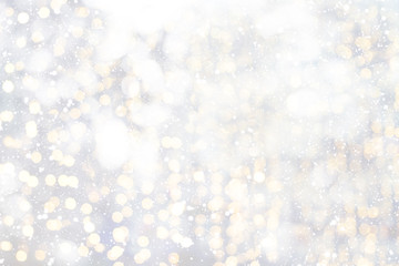 Christmas background - white glitter christmas abstract snow with blur bokeh light background.