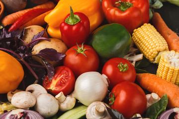 Fresh vegetables on wooden background