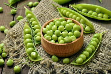 Ripe pods of green peas, fresh green peas