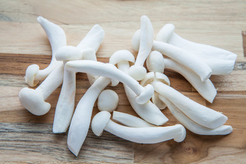 White Shimeji Mushroom on Wooden Board.