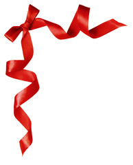 Red silk ribbon bow in corner composition