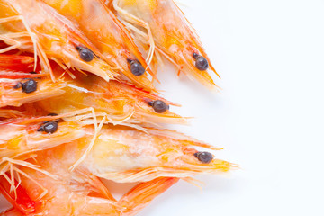 Cooked shrimps on white background.
