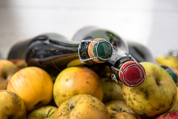 bottles of cider and apples of normandy