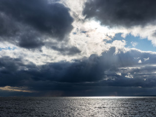 Beautiful sky over the sea after the storm. Religious context.