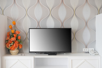 LCD television and flower decoration in the room
