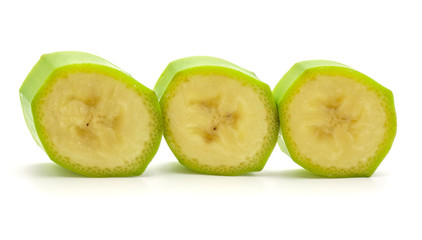 Sliced plantain rings in row isolated on white background.