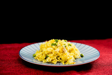 Homemade Chinese fried rice with vegetables and fried eggs