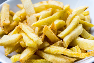 Golden French fries potatoes ready to be eaten
